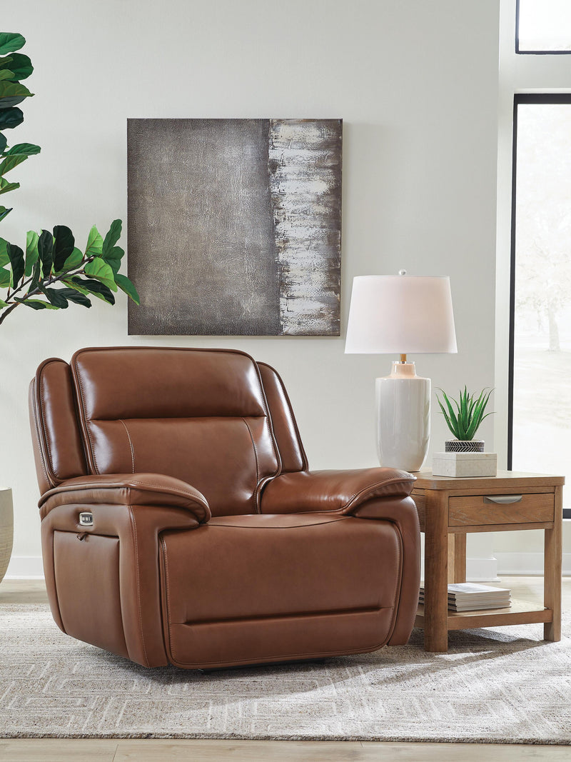 Ashley Furniture Healy Pier Power Recliner with plush upholstery, shown from a side angle in a closed position.