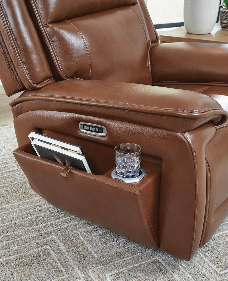 Ashley Furniture Healy Pier Power Recliner with side storage, featuring plush upholstery and a comfortable reclining design.