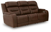 Ashley Furniture Knightington living room set with sofa and armchair in a modern design, shown from an angled view.