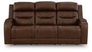 Ashley Furniture Knightington living room set with plush sofa and armchair, shown from the front with closed cushions.
