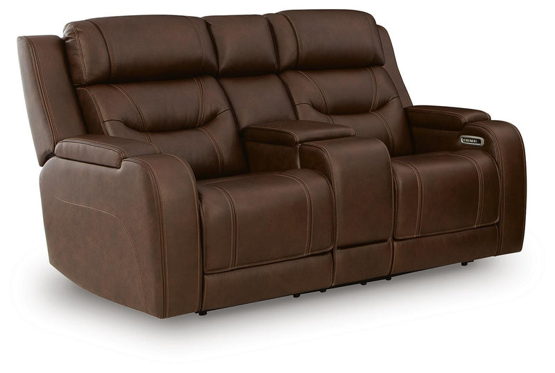 Ashley Furniture Knightington living room set with sofa and armchair, shown from an angled view in a modern living space.