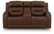 Ashley Furniture Knightington living room set with sofa, loveseat, and armchair in a cozy, modern design with neutral upholstery.