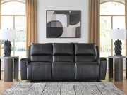 Ashley Furniture Glossmore reclining living room set with a sofa and chaise, featuring plush cushions and a modern design.