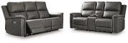 Ashley Furniture Bleckley reclining living room set with sofa and loveseat, featuring plush cushions and dark upholstery.