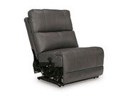Ashley Furniture Bleckley power reclining sectional in a stylish upholstery, shown from an angled view with closed recliners.
