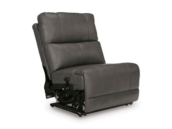 Ashley Furniture Bleckley power reclining sectional in a stylish upholstery, shown from an angled view with closed recliners.