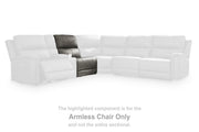 Ashley Furniture Bleckley Power Reclining Sectional with plush cushions and dark upholstery, shown in a spacious living room setting.