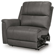 Ashley Furniture Bleckley power reclining sectional with plush cushions and leather upholstery, shown from an angled view.