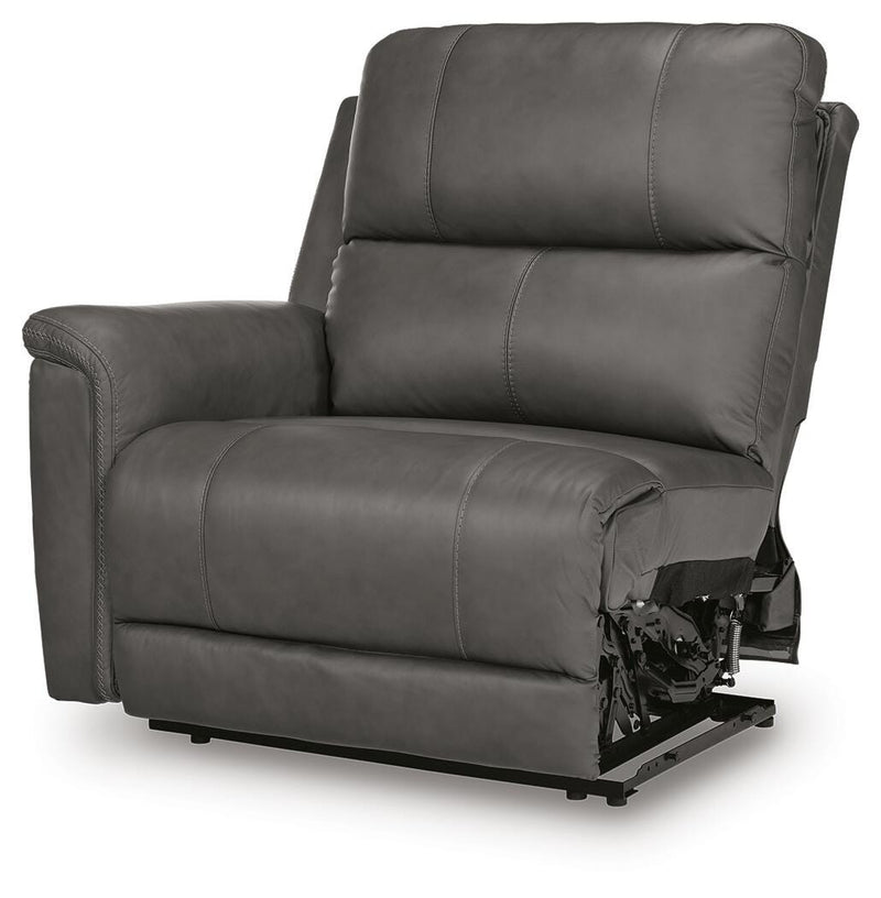 Ashley Furniture Bleckley power reclining sectional with plush cushions and leather upholstery, shown from an angled view.