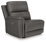 Ashley Furniture Bleckley power reclining sectional with plush cushions and reclining seats, shown from an angled view.