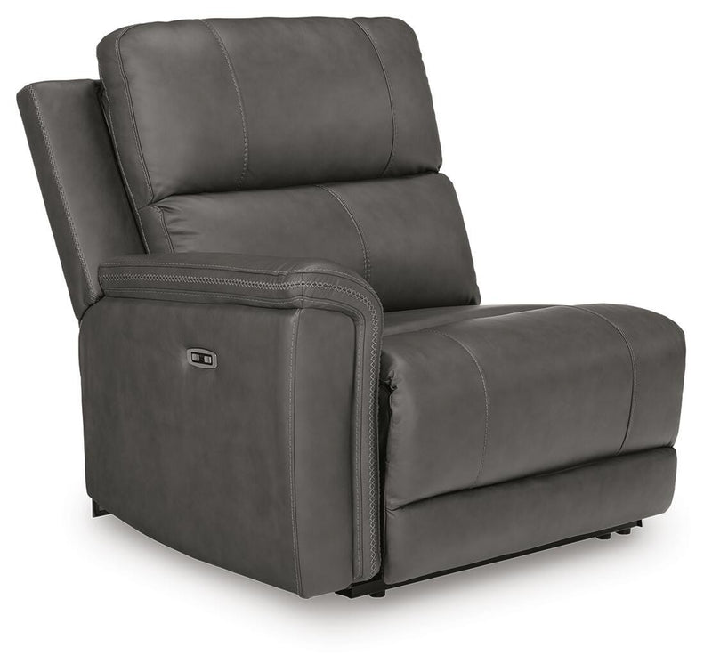 Ashley Furniture Bleckley power reclining sectional with plush cushions and reclining seats, shown from an angled view.
