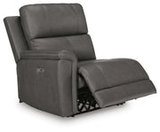 Ashley Furniture Bleckley power reclining sectional shown from an angle with open seats and plush cushions.