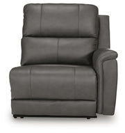 Ashley Furniture Bleckley power reclining sectional with plush cushions and reclining seats, shown from a head-on angle.