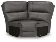 Ashley Furniture Bleckley power reclining sectional shown from a head-on view, featuring plush cushions and reclining seats.