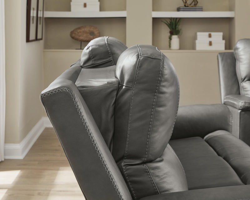 Ashley Furniture Bleckley reclining living room set with plush fabric sofa and loveseat, featuring adjustable reclining seats.
