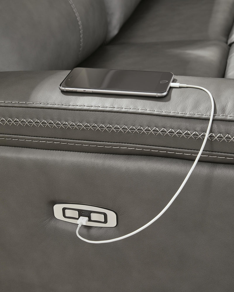 Ashley Furniture Bleckley power reclining sectional with USB ports, featuring plush cushions and a modern design in a neutral fabric.