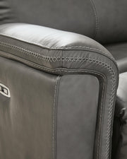 Ashley Furniture Bleckley Power Reclining Sectional with stitched upholstery and plush cushions, designed for comfort and style.