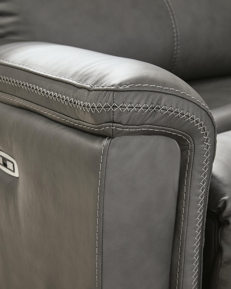 Ashley Furniture Bleckley Power Reclining Sectional with stitched upholstery and plush cushions, designed for comfort and style.