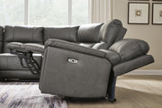 Ashley Furniture Bleckley power reclining sectional with plush cushions and zero gravity recline feature, shown in a modern living room setting.