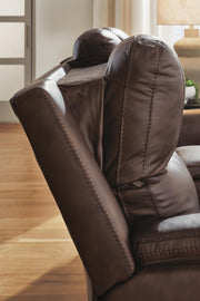Ashley Furniture Bleckley reclining living room set with sofa and loveseat, featuring plush cushions and dark upholstery.