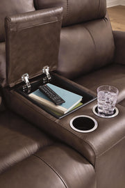 Close-up of the Ashley Furniture Bleckley Reclining Package living room set, showing the console detail and plush upholstery.