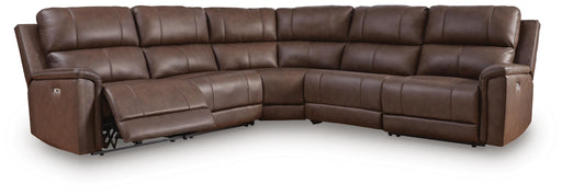 Ashley Furniture Bleckley power reclining sectional with plush cushions, dark gray upholstery, and modern design in a spacious living room setting.
