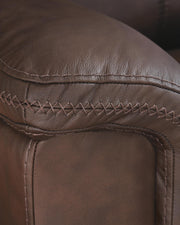 Ashley Furniture Bleckley power reclining sofa with plush upholstery and stitched detailing, designed for comfortable lounging.