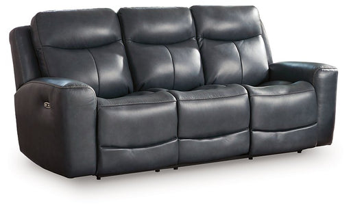 Ashley Furniture Next Move Power Reclining Sofa shown from an angled view, featuring plush cushions and modern design.