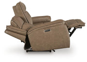 Ashley Furniture Glencroft reclining living room set with a sofa featuring side recliner and lay-flat design, shown in a living space.