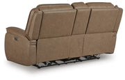 Ashley Furniture Glencroft reclining living room set with plush sofa and loveseat, shown from the back in a modern living room setting.