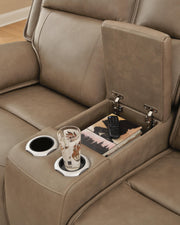Ashley Furniture Glencroft reclining living room set with console table, featuring plush upholstery and modern design details.