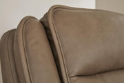 Ashley Furniture Glencroft reclining living room set with plush upholstery and welt-stitch details, shown in a cozy, modern design.