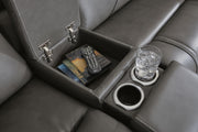 Ashley Furniture 5Z Pittson power reclining sectional loveseat with console, showing close-up of the built-in storage and reclining features.