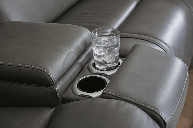 Ashley Furniture 5Z Pittson power reclining sectional loveseat with console, featuring plush cushions and built-in cup holders.