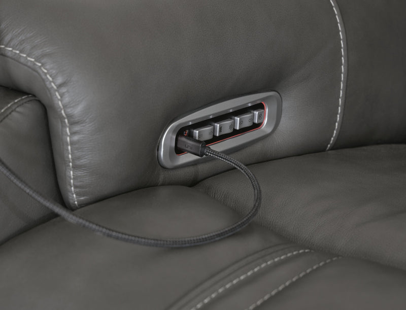 Ashley Furniture 5Z Pittson power reclining sectional loveseat with console, showing plush fabric, built-in USB ports, and reclining features.