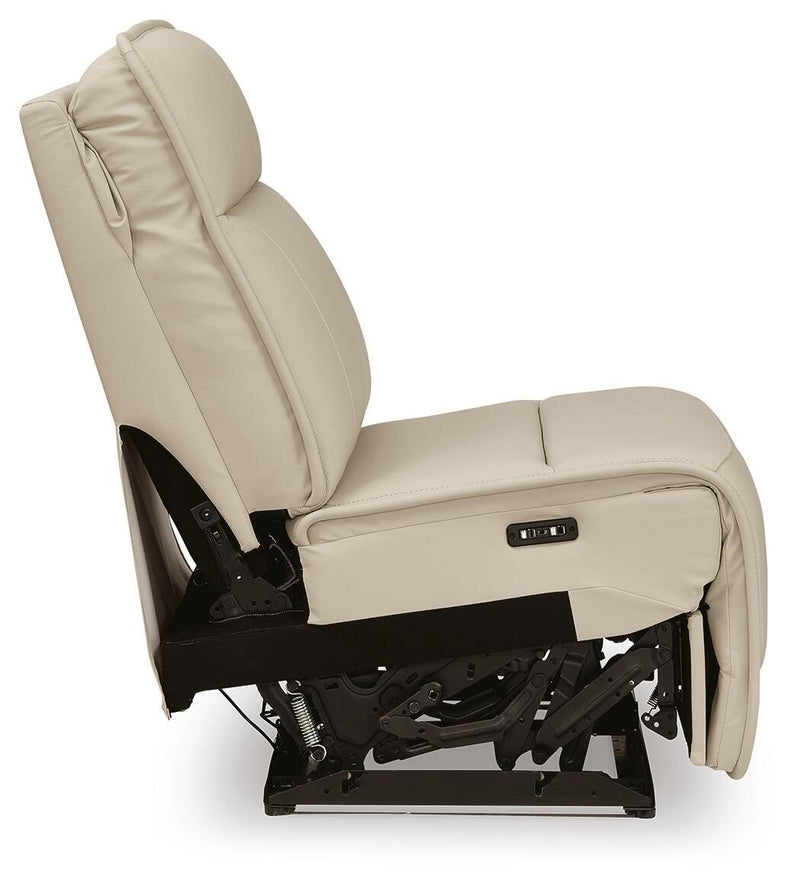 Ashley Furniture double deal reclining sectional showing plush cushions and reclining seats in a modern living room setup.