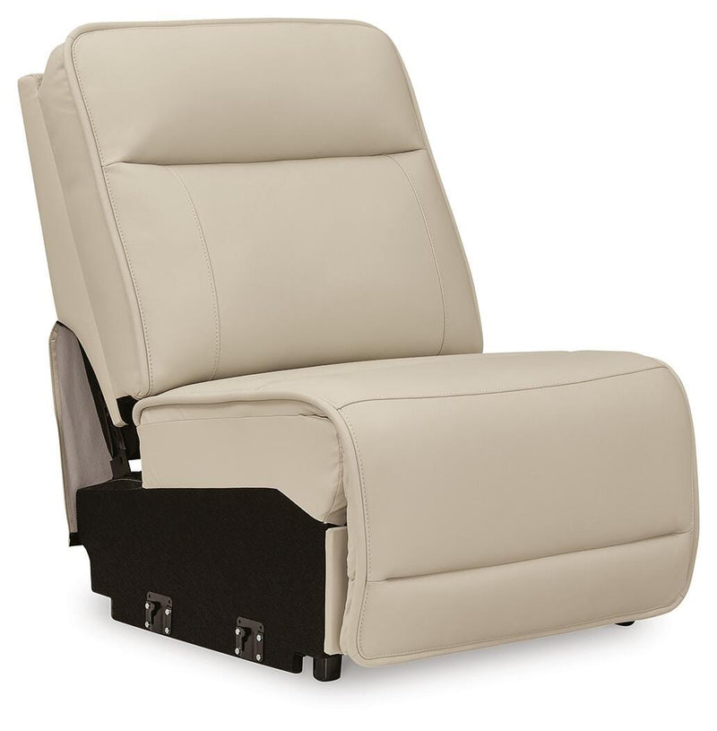 Ashley Furniture Double Deal reclining sectional sofa shown from an angle, featuring plush cushions and reclining seats.