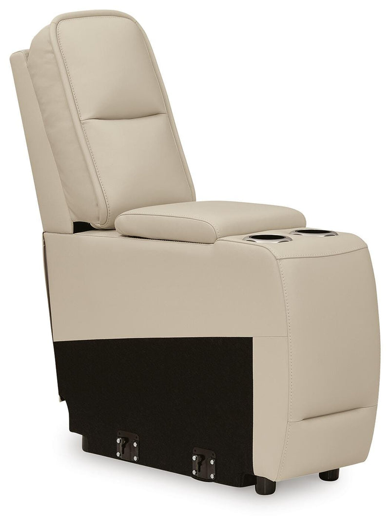 Ashley Furniture Double Deal reclining sectional with console, shown from an angled view with closed reclining features.