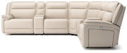 Ashley Furniture double reclining sectional with two consoles, featuring plush cushions and a modern design, shown from a head-on angle.