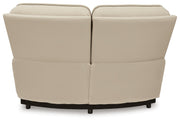 Ashley Furniture double deal reclining sectional with console, showing plush upholstered seats and built-in center console.