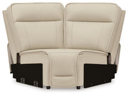Ashley Furniture Double Deal reclining sectional with plush cushions and fabric upholstery, shown from a head-on view.