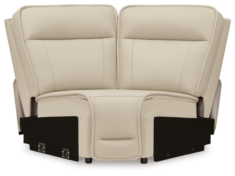 Ashley Furniture Double Deal reclining sectional with console, showing beige fabric upholstery and plush cushions.