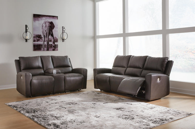Ashley Furniture Boxmere living room set with sofa, loveseat, and armchair in neutral fabric, arranged in a modern living space.
