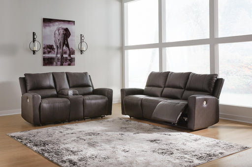 Ashley Furniture Boxmere living room set with sofa, loveseat, and armchair in neutral fabric, arranged in a modern living space.