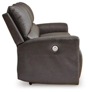 Ashley Furniture Boxmere power reclining sofa with plush cushions and reclining side, shown from the side perspective.