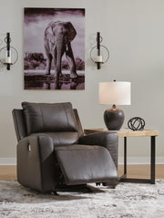 Open Ashley Furniture Boxmere Power Recliner showing plush cushioned seat, armrests, and reclining mechanism in a modern living room setting.