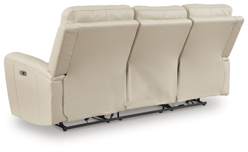 Ashley Furniture Dahlmoore power reclining sofa with plush cushions and built-in recline mechanism, shown from the back view.