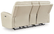 Ashley Furniture Dahlmoore power reclining loveseat with console, showing the back view with plush upholstery and reclining mechanisms.