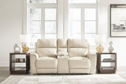 Ashley Furniture Dahlmoore power reclining loveseat with console, featuring plush fabric and built-in cup holders.