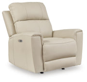 Ashley Furniture Dahlmoore power recliner in dark upholstery, shown from an angled view with closed recline and plush cushioning.